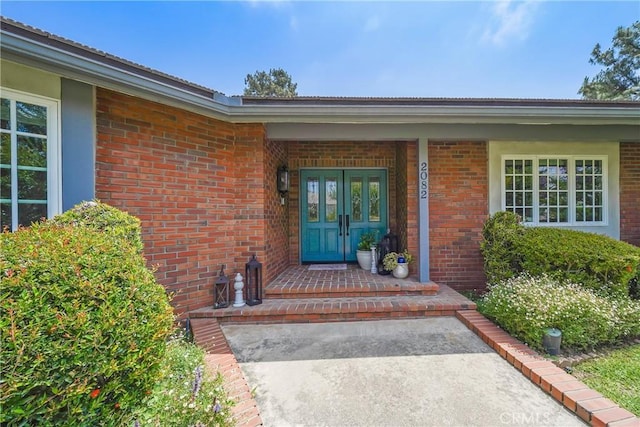2082 Kaia Ln, Sierra Madre, CA 91024 - view of exterior entry featuring brick siding and a porch