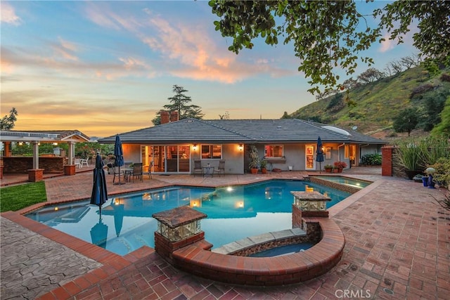 2082 Kaia Ln, Sierra Madre, CA 91024 - view of swimming pool with a pool with connected hot tub and a patio area