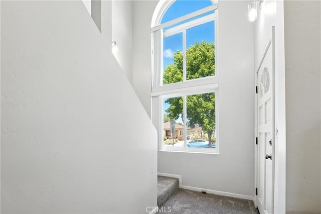 2275 Ximeno Ave, Long Beach, CA 90815 - staircase with carpet flooring and a towering ceiling