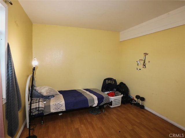3450 10th St, Clearlake, CA 95422 - bedroom with wood finished floors and baseboards
