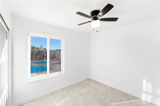 7293 Macy Ct, Riverside, CA 92503 - empty room with ceiling fan and light tile patterned floors