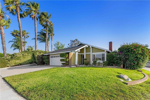7293 Macy Ct, Riverside, CA 92503 - view of front of home with concrete driveway, a garage, a front lawn, and a chimney