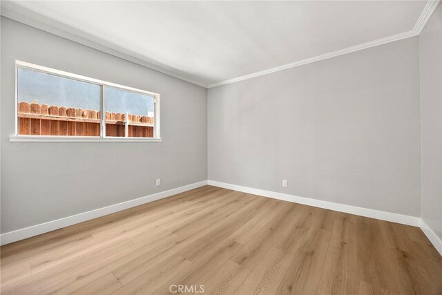 1141 N Palm St, La Habra, CA 90631 - spare room featuring ornamental molding and wood finished floors