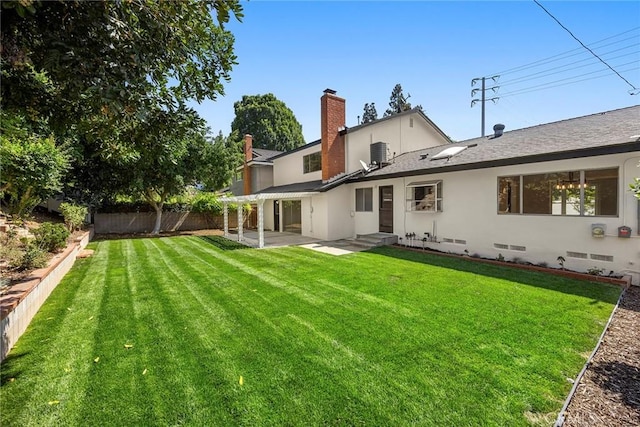 1141 N Palm St, La Habra, CA 90631 - rear view of house with a fenced backyard, a chimney, a patio area, and stucco siding