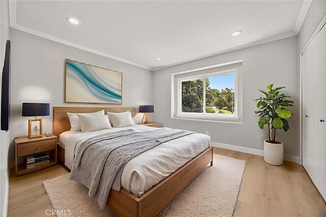 1141 N Palm St, La Habra, CA 90631 - bedroom featuring a closet, light wood-style flooring, recessed lighting, and ornamental molding