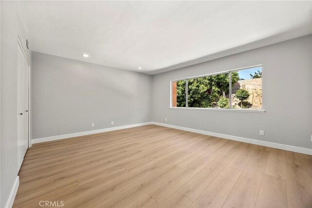 1141 N Palm St, La Habra, CA 90631 - empty room featuring light wood-style flooring and recessed lighting