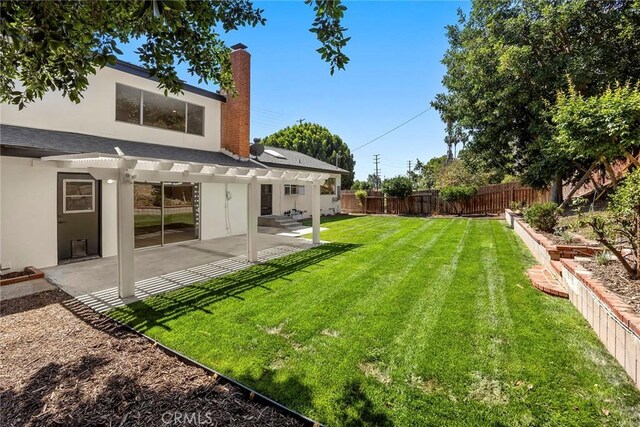 1141 N Palm St, La Habra, CA 90631 - fenced backyard with a patio area and a pergola