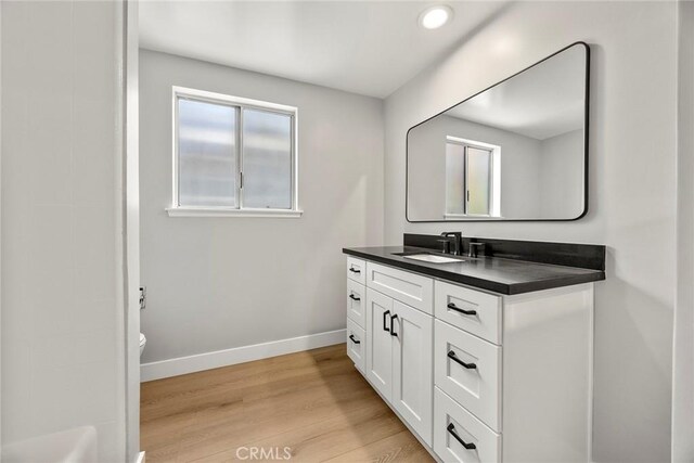 1141 N Palm St, La Habra, CA 90631 - full bathroom with vanity, wood finished floors, and recessed lighting
