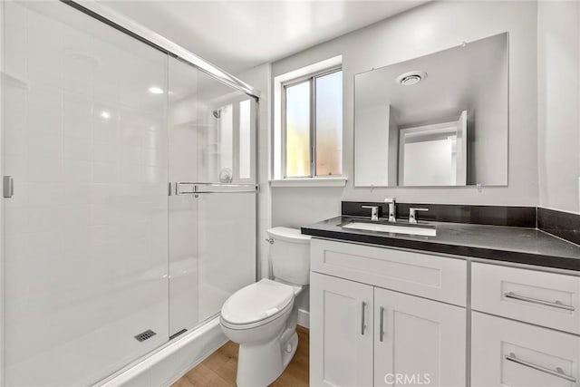 1141 N Palm St, La Habra, CA 90631 - full bathroom featuring vanity, a shower stall, and wood finished floors