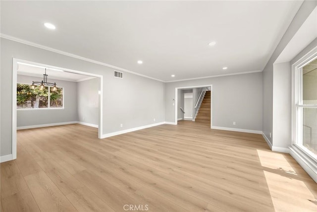 1141 N Palm St, La Habra, CA 90631 - spare room with a chandelier, recessed lighting, stairway, light wood-style floors, and ornamental molding