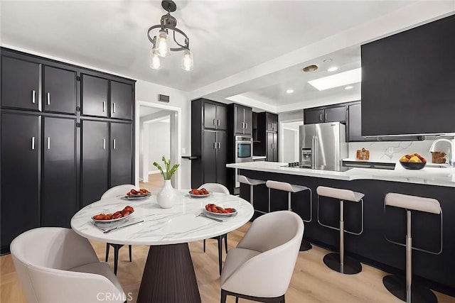 1141 N Palm St, La Habra, CA 90631 - dining room with light wood-style floors and recessed lighting