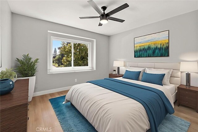 1141 N Palm St, La Habra, CA 90631 - bedroom with light wood finished floors and a ceiling fan