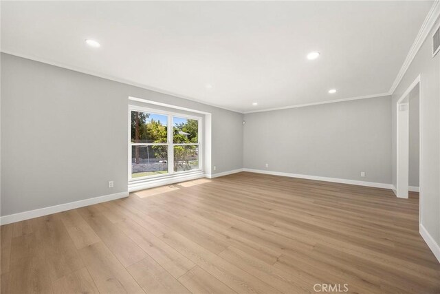 1141 N Palm St, La Habra, CA 90631 - spare room with ornamental molding, light wood-style floors, and recessed lighting