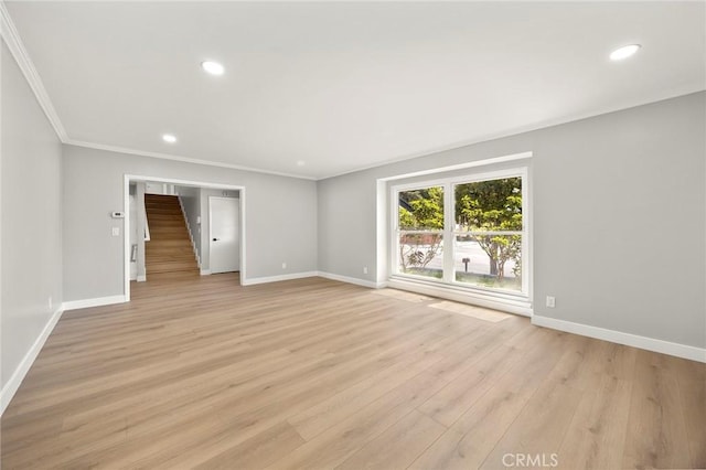 1141 N Palm St, La Habra, CA 90631 - spare room with crown molding, recessed lighting, light wood-style floors, and stairs