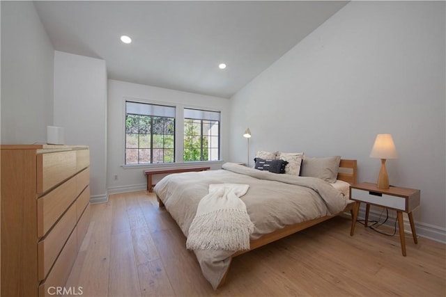 7 Luzern, Mission Viejo, CA 92692 - bedroom featuring light wood-style flooring, lofted ceiling, and recessed lighting