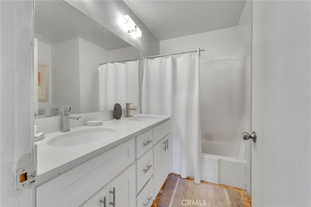 1926 E 7th St, Ontario, CA 91764 - full bathroom featuring double vanity and shower / bath combo with shower curtain