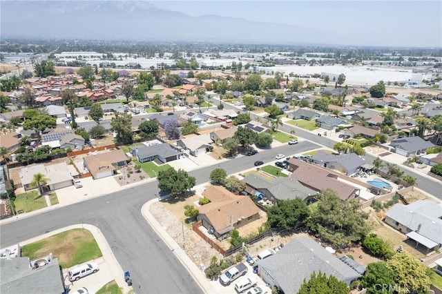 1926 E 7th St, Ontario, CA 91764 - aerial overview of property's location featuring mountains and nearby suburban area