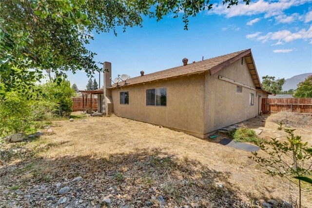 1926 E 7th St, Ontario, CA 91764 - back of property featuring stucco siding