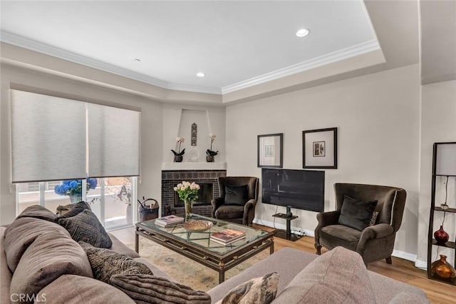 14535 Margate St Unit 13, Sherman Oaks, CA 91411 - living room featuring a fireplace, ornamental molding, wood finished floors, recessed lighting, and a tray ceiling