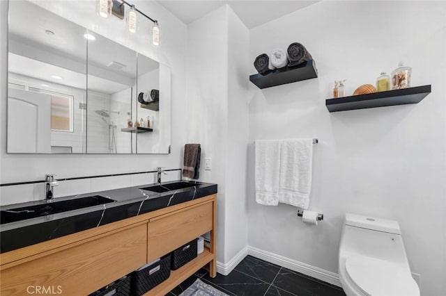 14535 Margate St Unit 13, Sherman Oaks, CA 91411 - full bath with double vanity, marble look tile flooring, and a tile shower