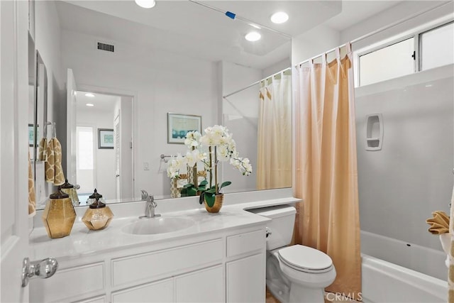 16778 Bayview Dr Unit B, Huntington Beach, CA 92649 - full bath featuring vanity, shower / bath combo with shower curtain, and recessed lighting