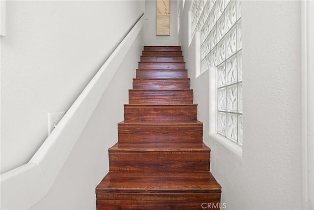 16778 Bayview Dr Unit B, Huntington Beach, CA 92649 - stairs featuring a textured wall