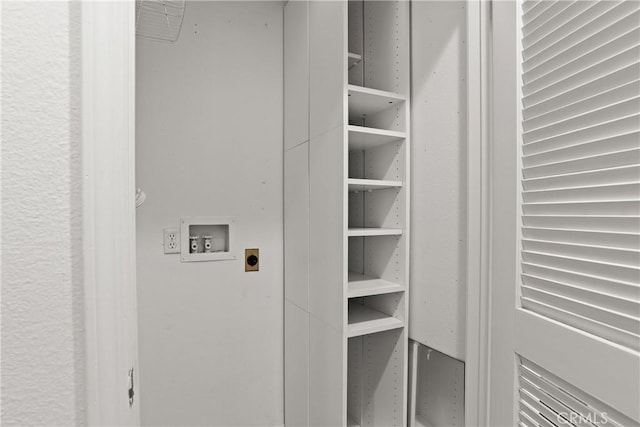 16778 Bayview Dr Unit B, Huntington Beach, CA 92649 - washroom featuring washer hookup and electric dryer hookup