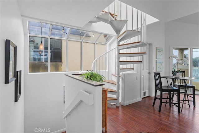 16778 Bayview Dr Unit B, Huntington Beach, CA 92649 - staircase featuring wood finished floors and baseboards