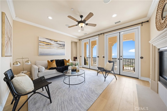 2 Cresta Del Sol, San Clemente, CA 92673 - living room with ornamental molding, french doors, light wood finished floors, ceiling fan, and recessed lighting