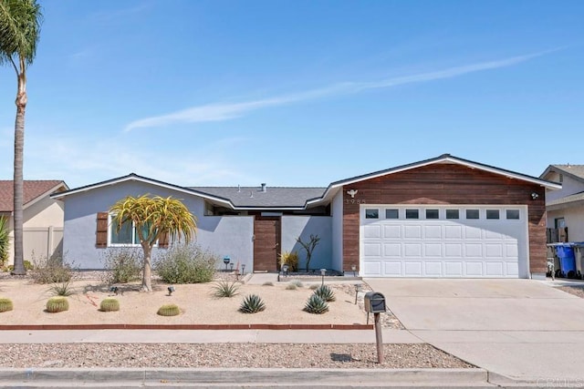 3985 Shenandoah Dr, Oceanside, CA 92056 - view of front of home featuring concrete driveway and an attached garage