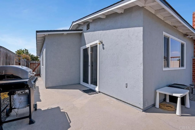3985 Shenandoah Dr, Oceanside, CA 92056 - view of home's exterior with stucco siding and a patio area