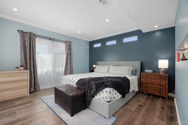 3985 Shenandoah Dr, Oceanside, CA 92056 - bedroom with wood finished floors, crown molding, and recessed lighting