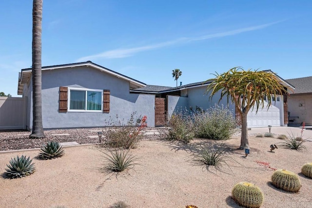 3985 Shenandoah Dr, Oceanside, CA 92056 - ranch-style house with a garage, stucco siding, and concrete driveway