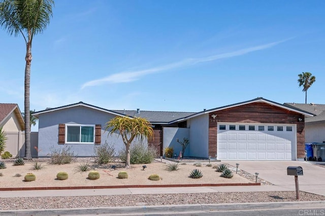 3985 Shenandoah Dr, Oceanside, CA 92056 - view of front facade with driveway and an attached garage