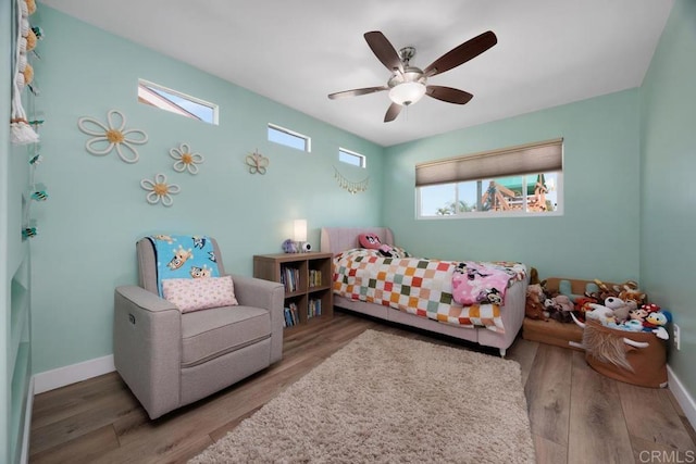3985 Shenandoah Dr, Oceanside, CA 92056 - bedroom with wood finished floors and a ceiling fan