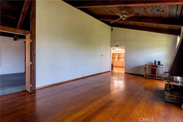 1878 Molino Ave N, Signal Hill, CA 90755 - unfurnished living room with ceiling fan, wood-type flooring, wooden ceiling, and brick wall
