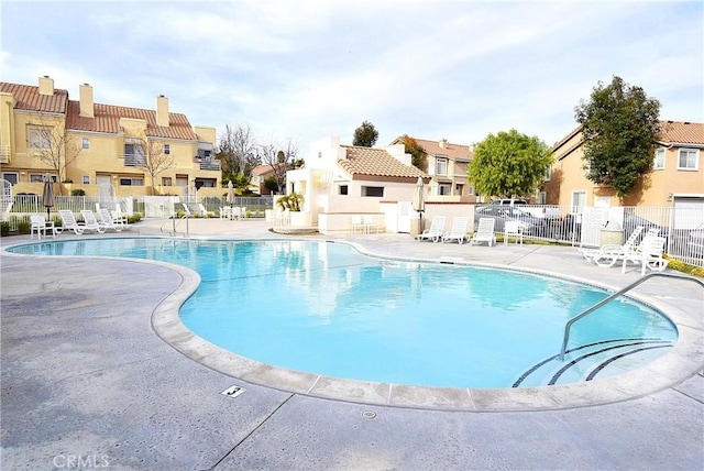 25748 Perlman Pl Unit B, Stevenson Ranch, CA 91381 - community pool with a residential view and a patio