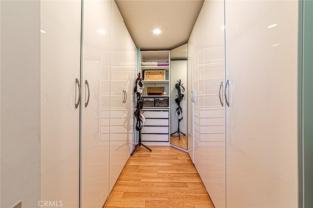 25748 Perlman Pl Unit B, Stevenson Ranch, CA 91381 - corridor featuring light wood-type flooring and recessed lighting