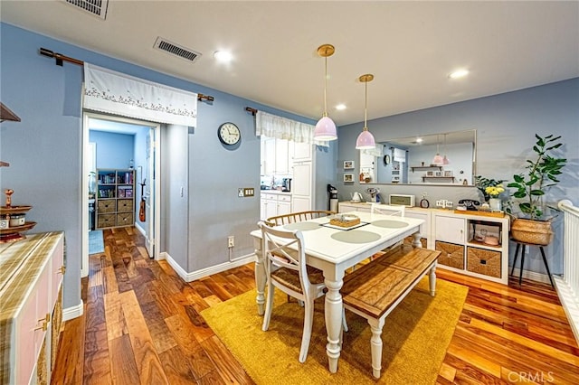 25748 Perlman Pl Unit B, Stevenson Ranch, CA 91381 - dining room featuring wood finished floors and recessed lighting
