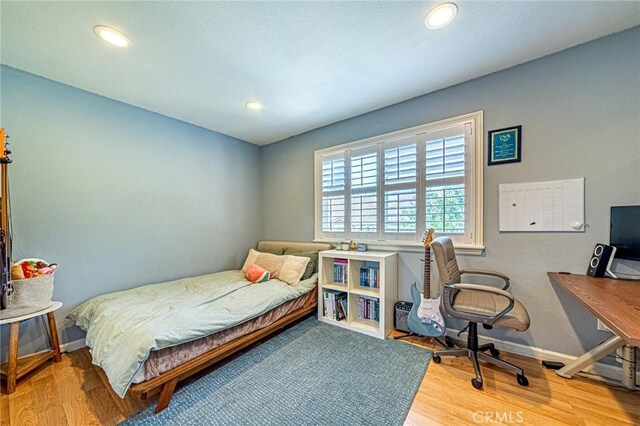25748 Perlman Pl Unit B, Stevenson Ranch, CA 91381 - bedroom featuring wood finished floors, an office area, and recessed lighting