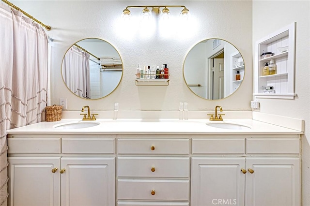 25748 Perlman Pl Unit B, Stevenson Ranch, CA 91381 - bathroom with double vanity and curtained shower