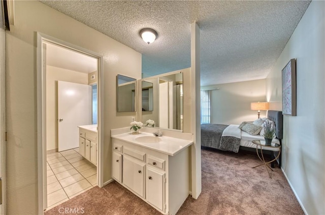 315 Spencer Ave, Upland, CA 91786 - ensuite bathroom with vanity and a textured ceiling