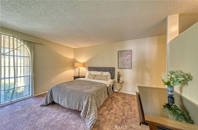 315 Spencer Ave, Upland, CA 91786 - bedroom featuring multiple windows, carpet, and a textured ceiling