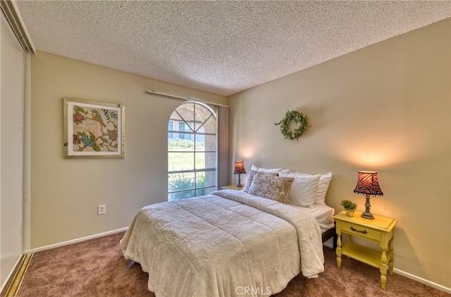 315 Spencer Ave, Upland, CA 91786 - bedroom featuring dark colored carpet and a textured ceiling