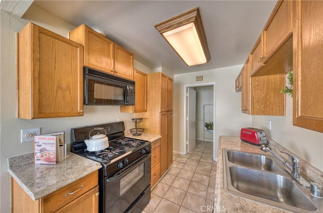 315 Spencer Ave, Upland, CA 91786 - kitchen featuring black appliances, light countertops, and light tile patterned floors