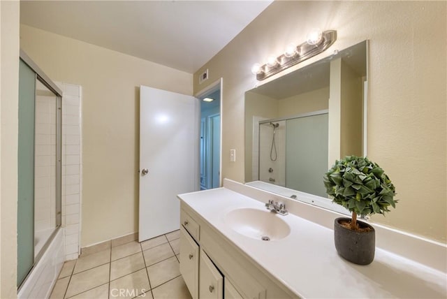 315 Spencer Ave, Upland, CA 91786 - bathroom featuring vanity, tile patterned floors, and shower / bath combination with glass door