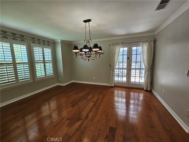 41710 Crispi Ln, Lancaster, CA 93536 - empty room with a chandelier, french doors, dark wood-style floors, and ornamental molding