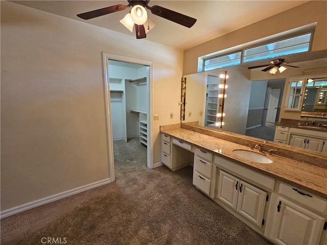 41710 Crispi Ln, Lancaster, CA 93536 - full bathroom with ceiling fan, carpet floors, vanity, and a walk in closet