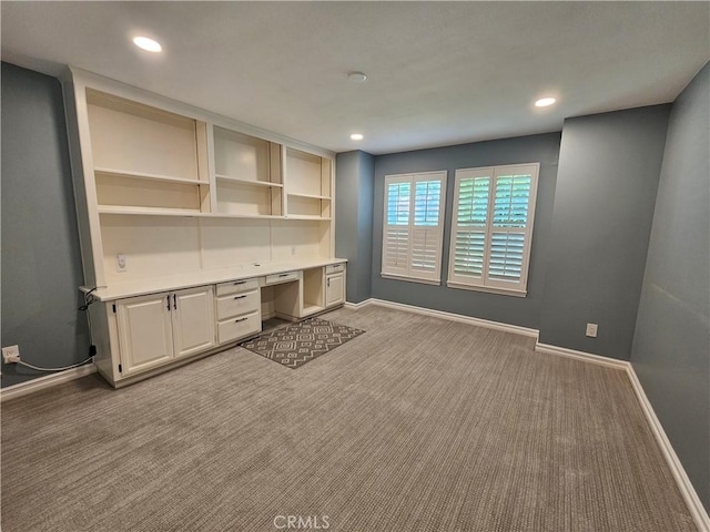 41710 Crispi Ln, Lancaster, CA 93536 - unfurnished office with carpet flooring, built in desk, and recessed lighting
