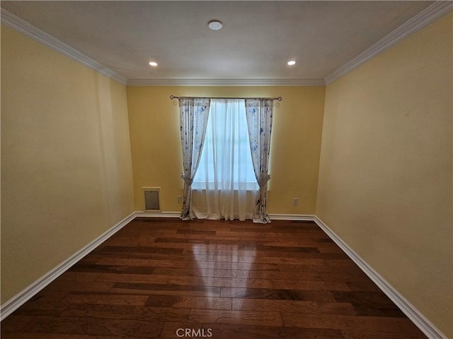 41710 Crispi Ln, Lancaster, CA 93536 - spare room with dark wood finished floors, ornamental molding, and recessed lighting